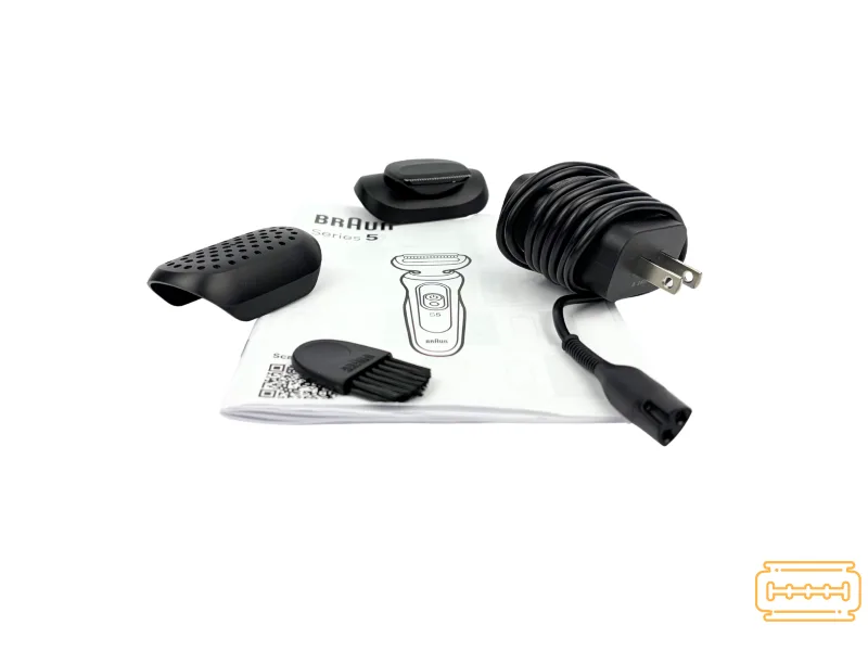 Braun Series 5 all accessories. Foil protector, trimmer, charger, brush on top of manual.