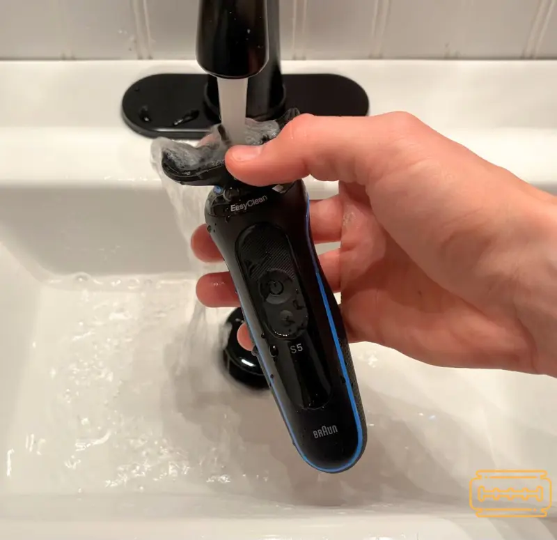 Rinsing the Braun Series 5 over sink with cassette removed.