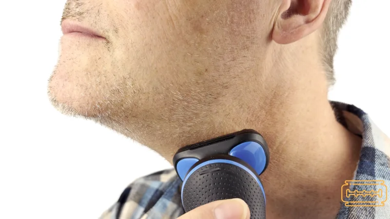 Man shaving his neck with the Braun Series 5.